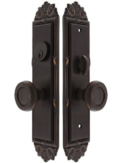 Regency F20 Function Mortise Lock Entryset in Oil Rubbed Bronze with Left Hand Ribbon and Reed Knobs, and Stop/Release Buttons.